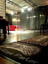 a room with a rug and a couch
